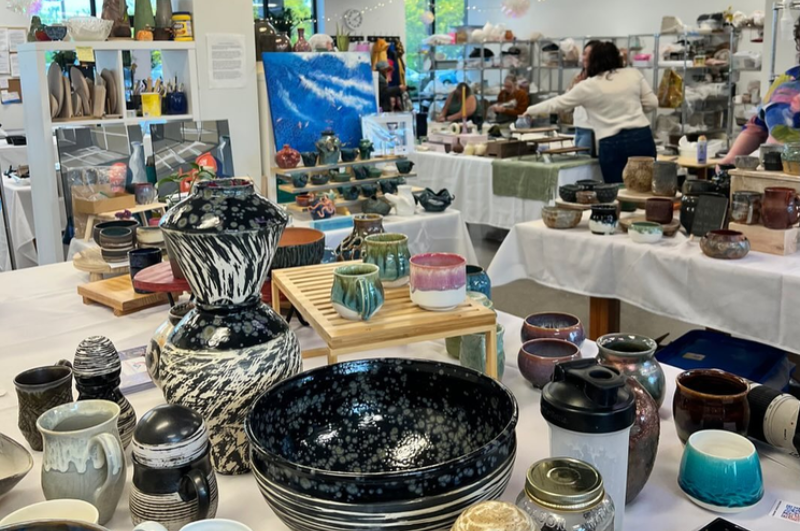 A variety of ceramic vases, bowls, and mugs created at Cascades Ceramics Studio.